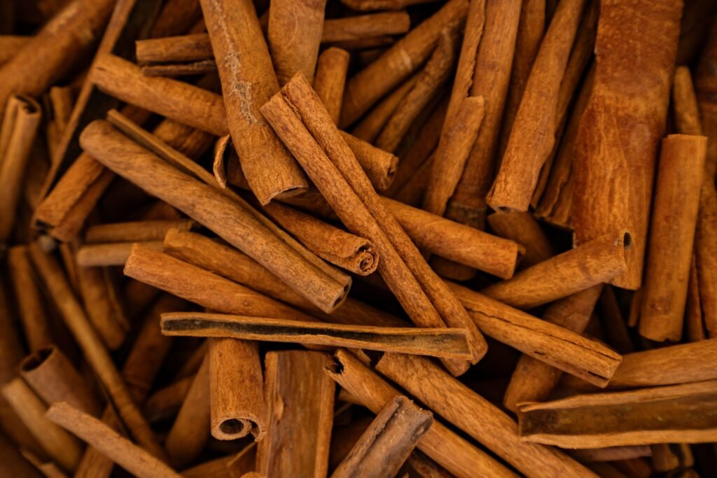 cinnamon sticks background scaled cinnamon sticks background scaled
